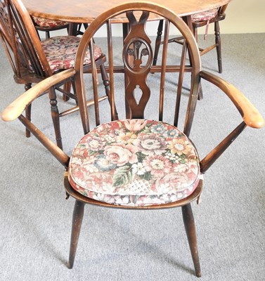 Lot 531 - An Ercol table and chairs