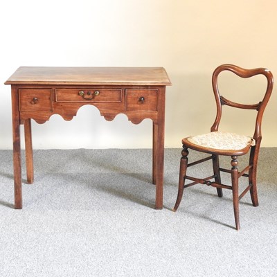 Lot 593 - A lowboy and a chair