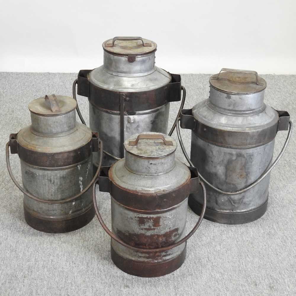 Lot 399 - A pair of decorative metal milk churns