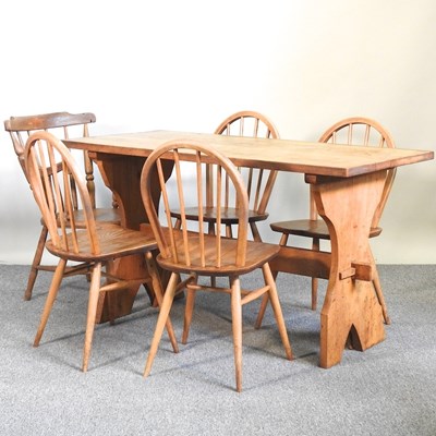 Lot 660 - A table and chairs