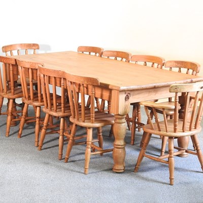 Lot 457 - A pine table and chairs