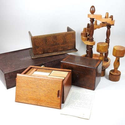 Lot 166 - A wooden brick game, tea caddy and book stand