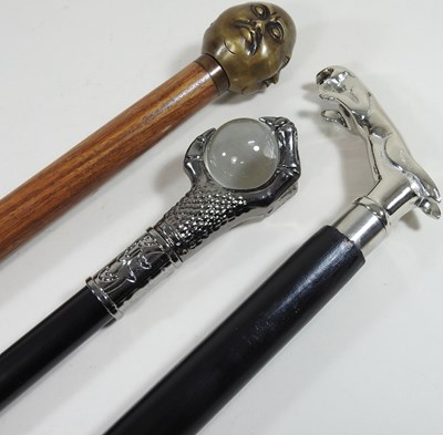 Lot 420 - Three walking sticks