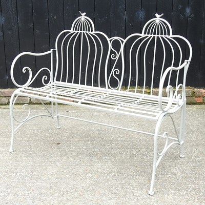 Lot 619 - A painted metal garden bench