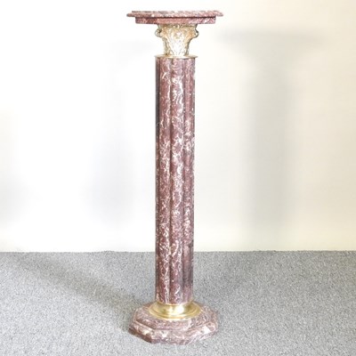 Lot 591 - A rouge marble jardiniere stand