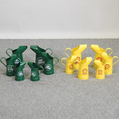 Lot 440 - A set of six modern painted metal oil cans