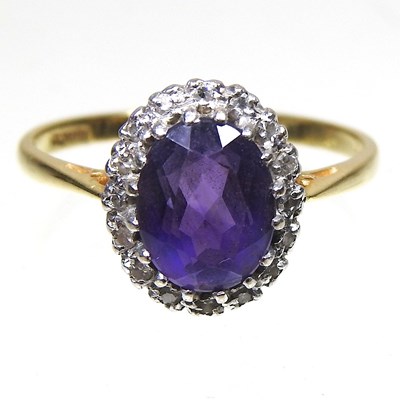 Lot 659 - An 18 carat gold ring