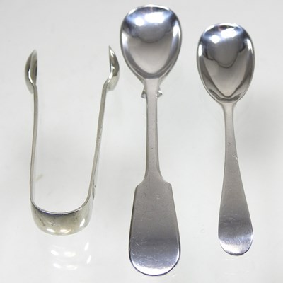 Lot 353 - A silver spoon, another and a pair of sugar nips