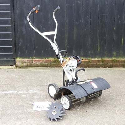 Lot 318 - A Stihl petrol garden scarifier