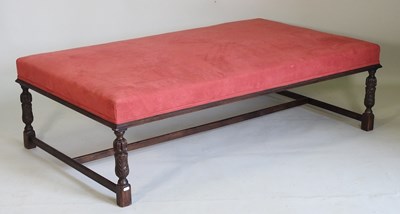 Lot 203 - A large red upholstered coffee table