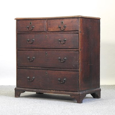 Lot 634 - A George III oak chest