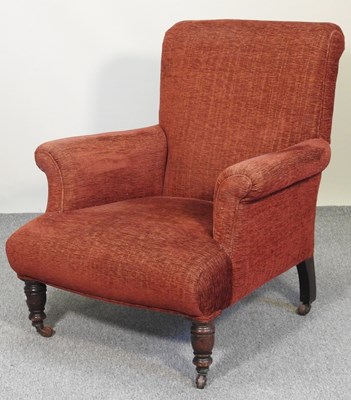 Lot 463 - A red upholstered armchair