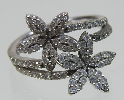 Lot 28 - A 9 carat gold double flower cluster ring