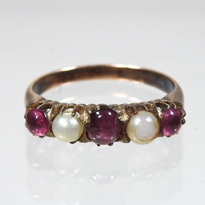 Lot 303 - An unmarked ruby and cultured pearl ring
