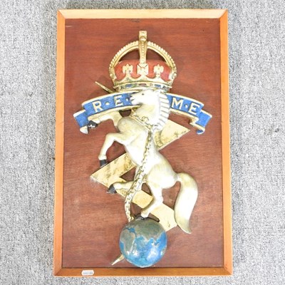 Lot 576 - A REME cast iron military plaque