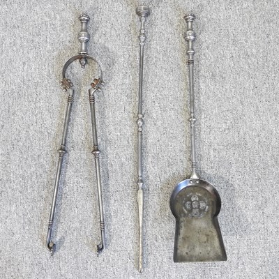 Lot 553 - A set of blacksmith made fire tools