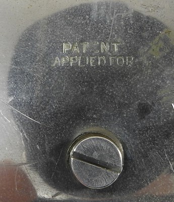 Lot 27 - A patent pocket watch holder