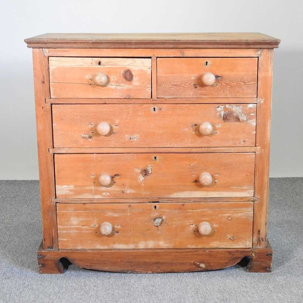 Lot 634 - An antique pine chest