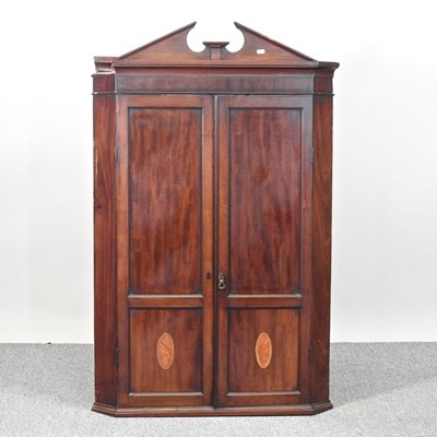 Lot 141 - A George III mahogany and inlaid hanging corner cabinet