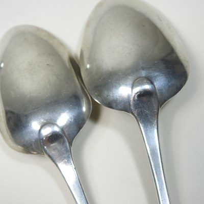 Lot 104 - Three George III silver spoons