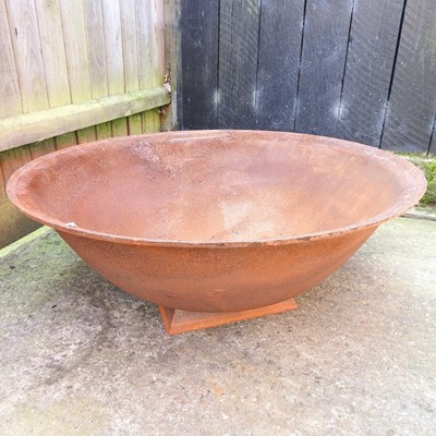Lot 137 - A rusted metal fire pit