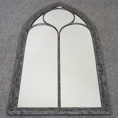 Lot 629 - An arched garden mirror