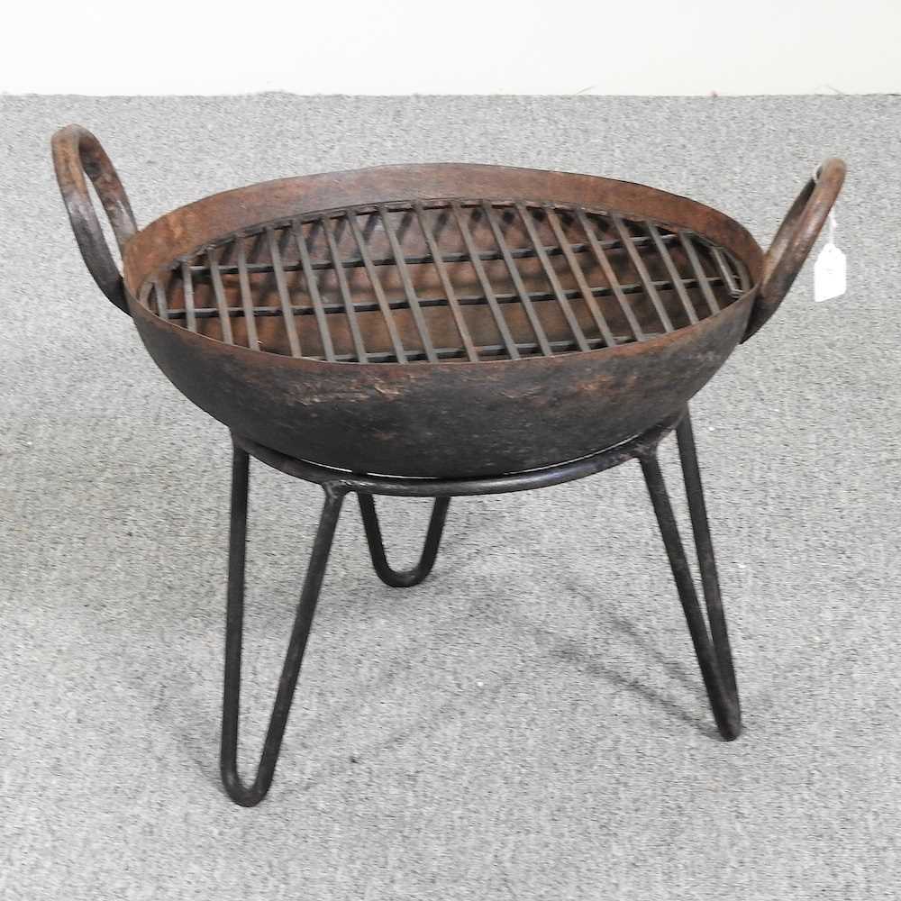 Lot 412 - A small kadai fire pit