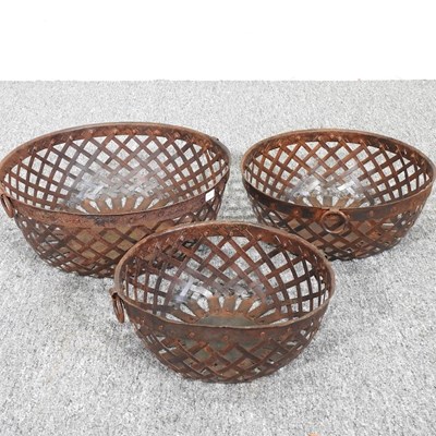 Lot 555 - A set of three lattice bowls