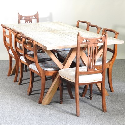 Lot 628 - A table and chairs