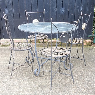 Lot 71 - A table and chairs