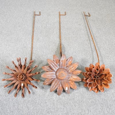 Lot 445 - Three large rusted flower heads