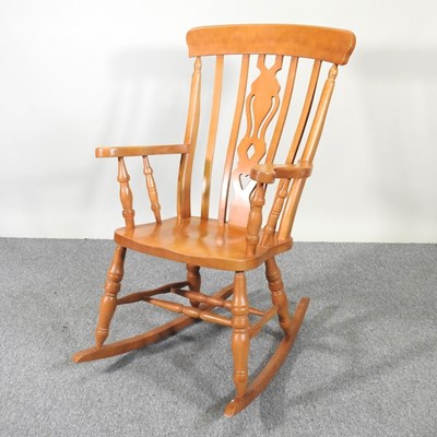 Lot 97 - A beeck rocking chair and pine table