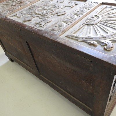 Lot 85 - A 19th century carved oak coffer