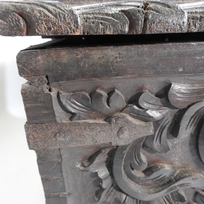 Lot 46 - An unusual 19th century continental heavily carved oak coffer