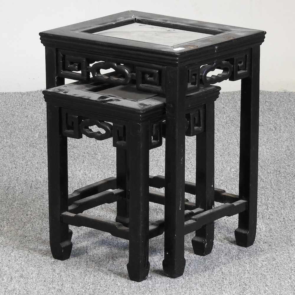 Lot 504 An early 20th century Chinese nest of tables