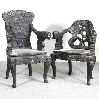 Lot 512 - Two early 20th century Chinese carved hardwood armchairs