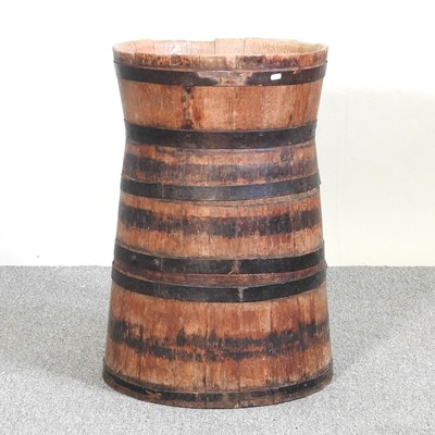 Lot 16 - An antique coopered wooden barrel