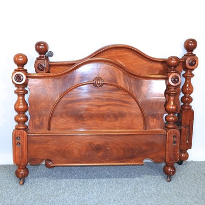 Lot 648 - A pair of Victorian mahogany double bed ends