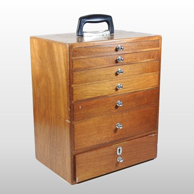 Lot 133 - A mid 20th century teak dentist's cabinet