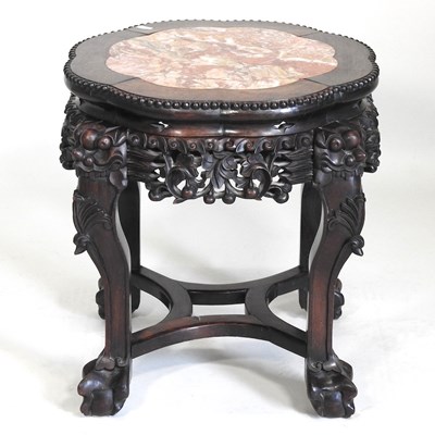 Lot 348 - An early 20th century Chinese carved jardinière stand