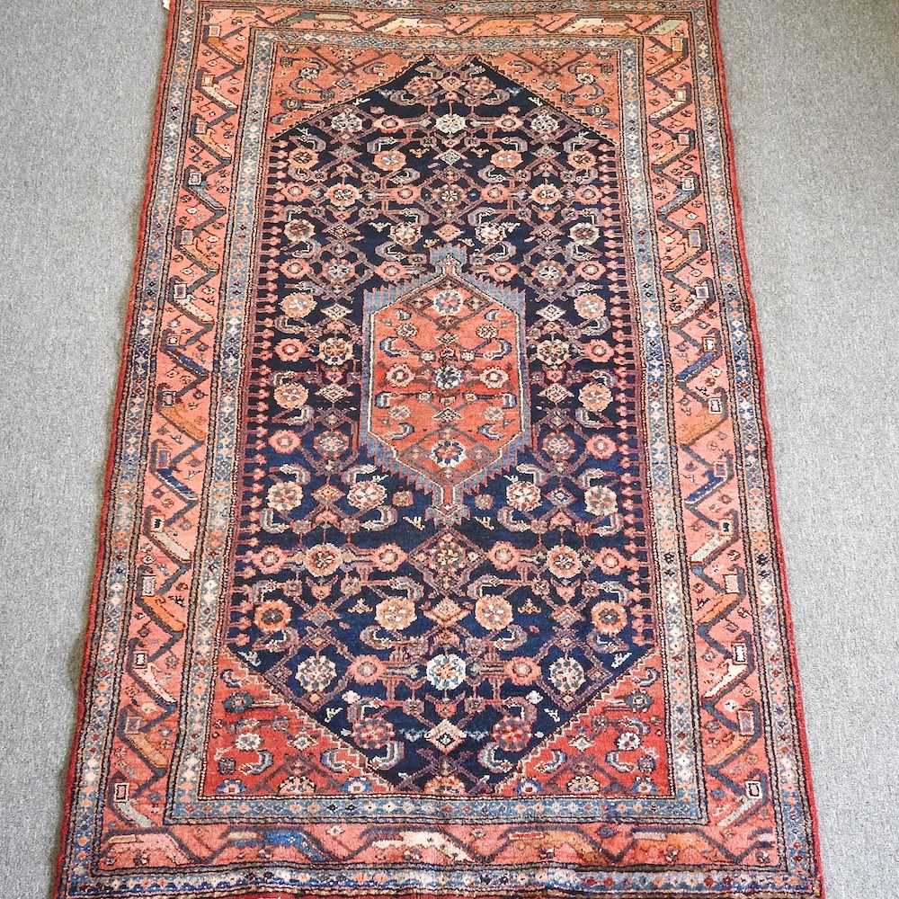 Lot 224 A Persian rug