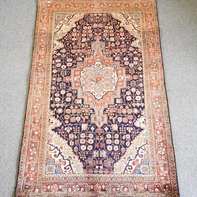 Lot 221 - A Persian rug