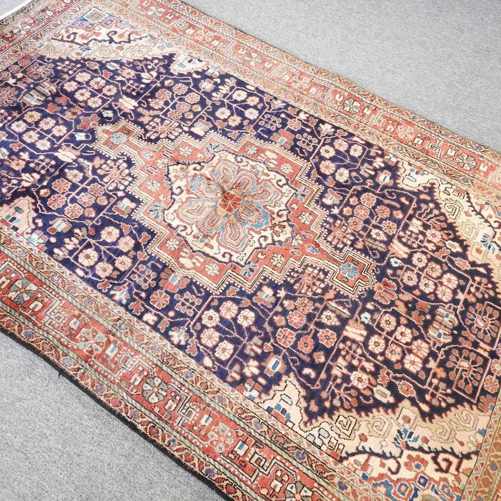 Lot 221 A Persian rug