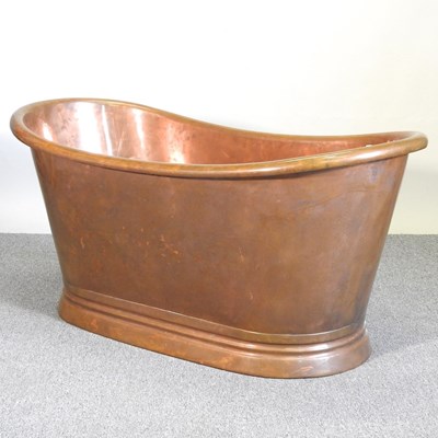 Lot 80 - A copper roll-top bath tub