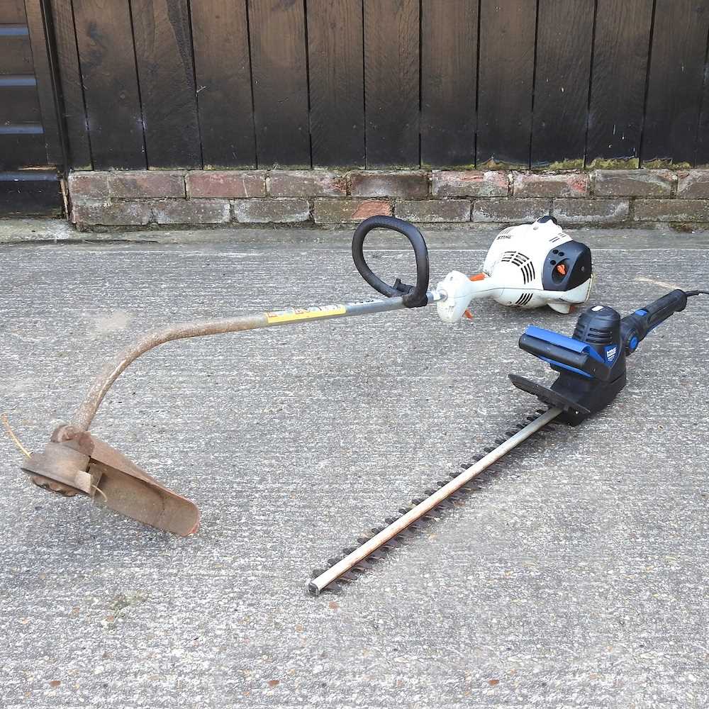 Lot 194 - A Stihl strimmer and Macallister hedge cutter