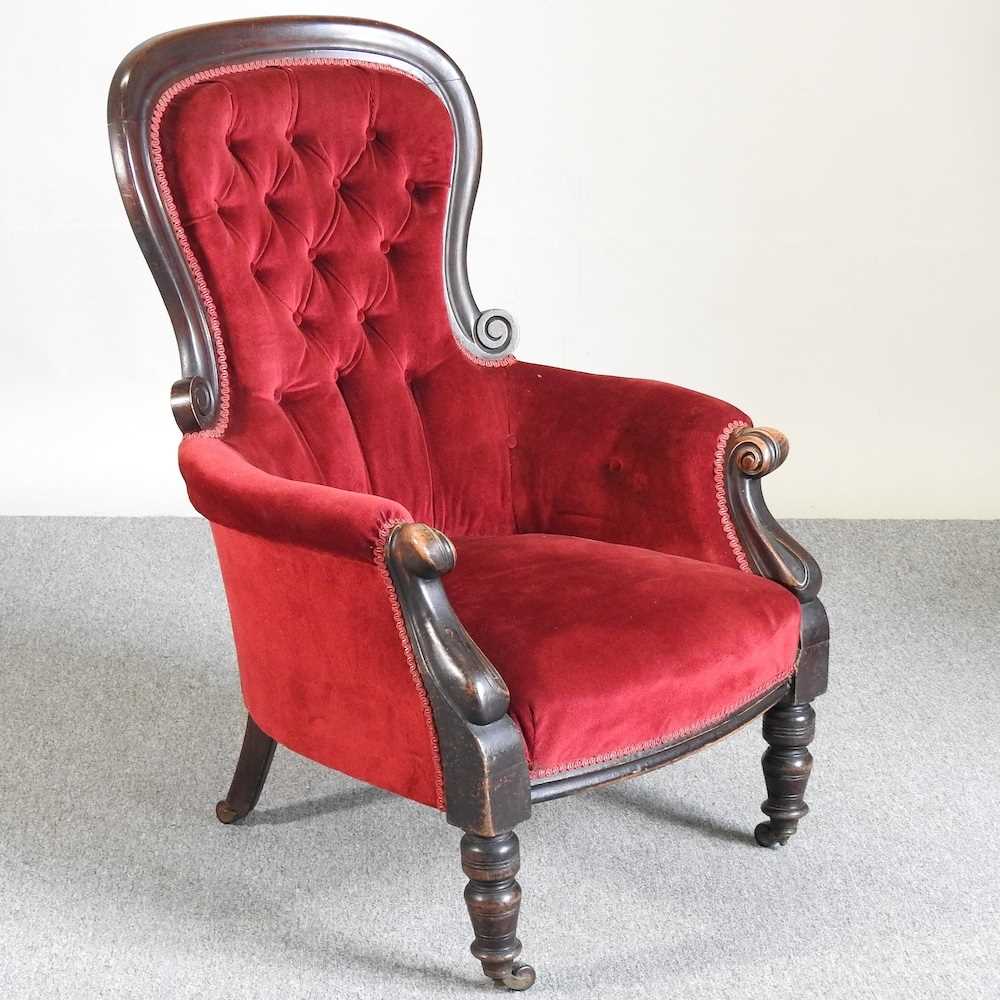 Lot 510 - A Victorian red upholstered armchair