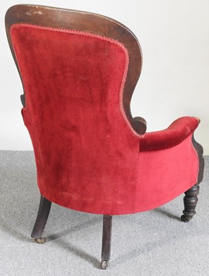 Lot 510 - A Victorian red upholstered armchair