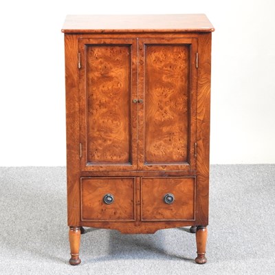 Lot 46 - A burr elm cabinet