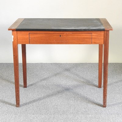 Lot 252 - A 1960's teak writing desk