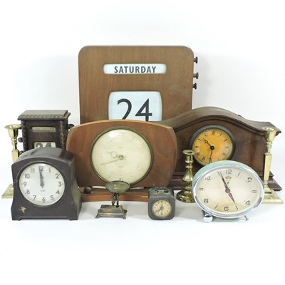 Lot 456 - A 1930's wall calendar, desk calendar and clocks